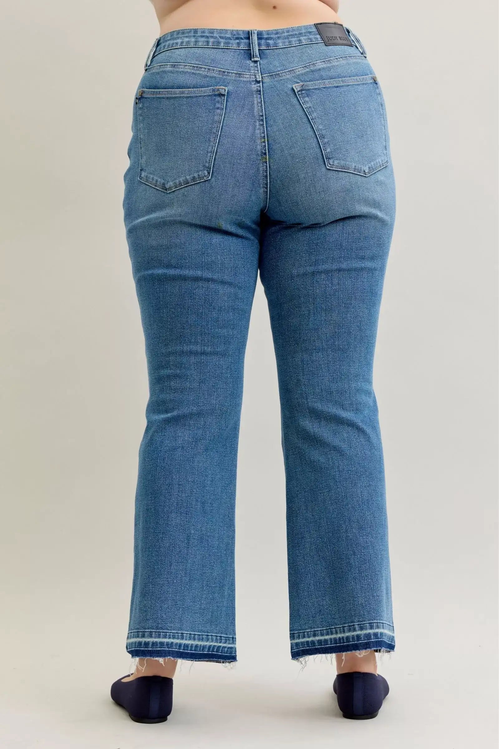 Judy Blue Full Size Mid Rise Slim Bootcut Tummy Control Release Hem Jeans Plus Size - Jeans Junction Online
