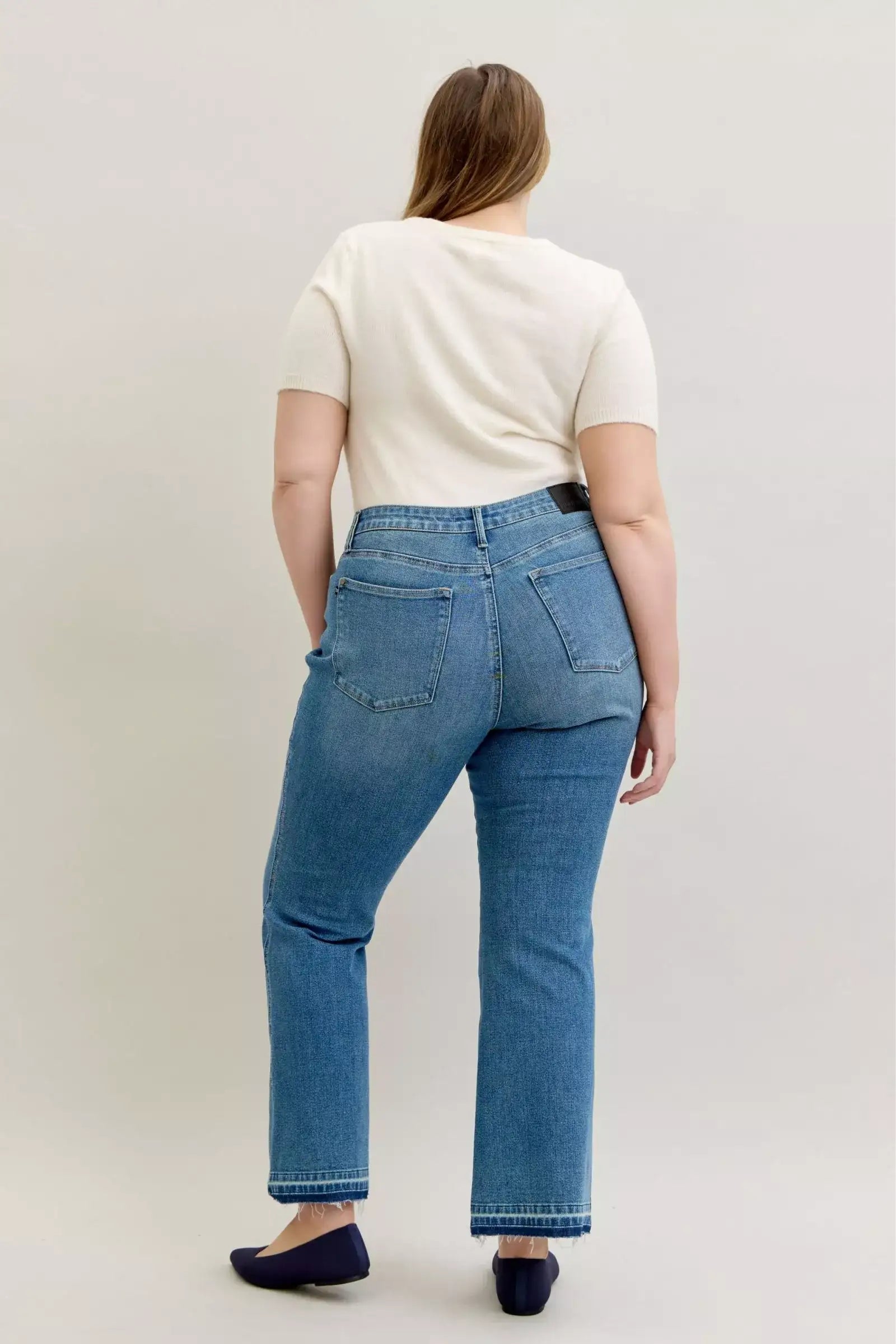 Judy Blue Full Size Mid Rise Slim Bootcut Tummy Control Release Hem Jeans Plus Size - Jeans Junction Online