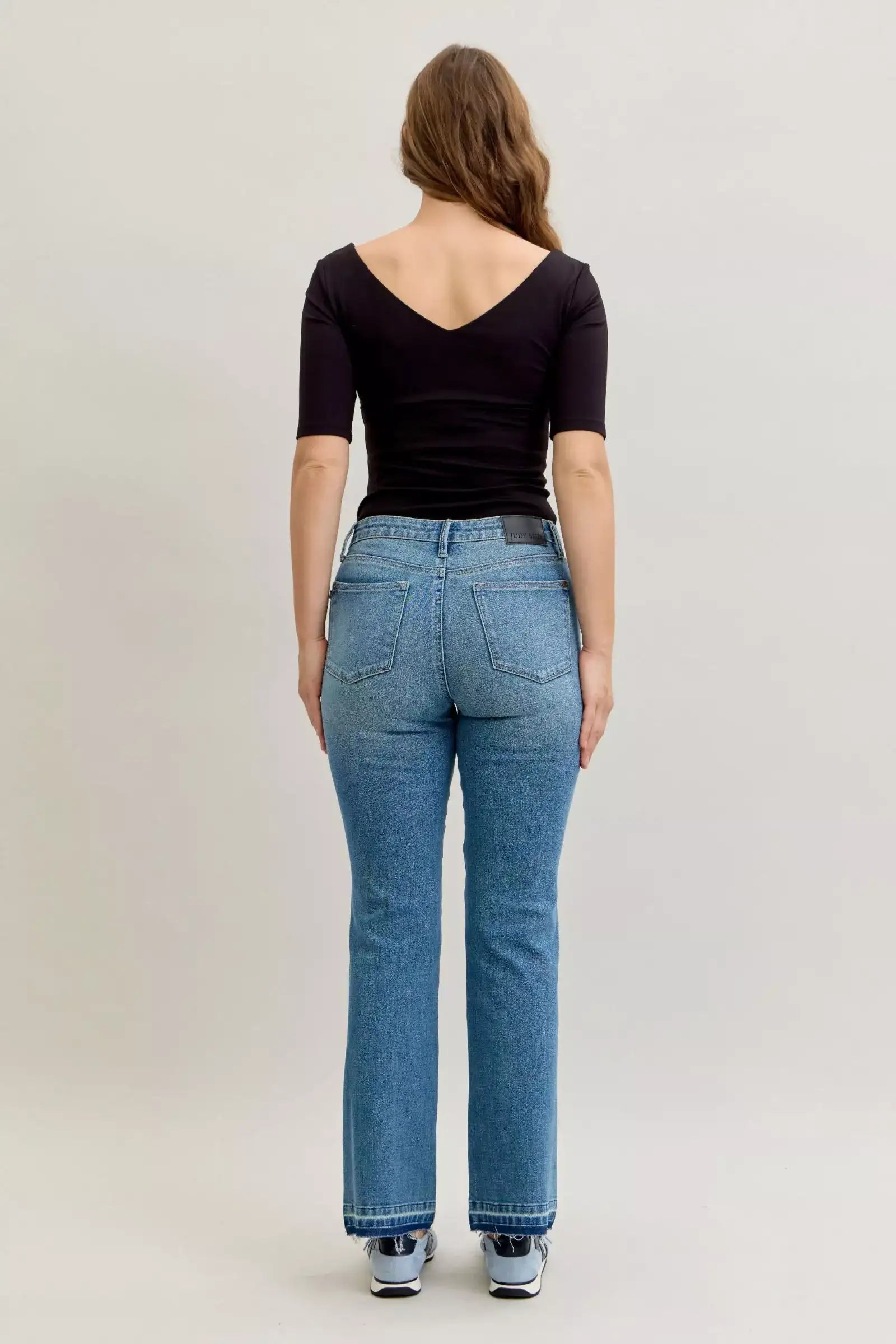 Judy Blue Full Size Mid Rise Slim Bootcut Tummy Control Release Hem Jeans Plus Size - Jeans Junction Online